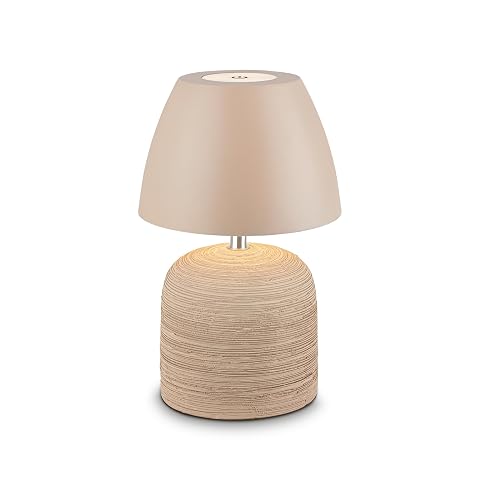 Lampe de table sans fil beige, avec pied en céramique et lumière blanc chaud sur une table en bois.