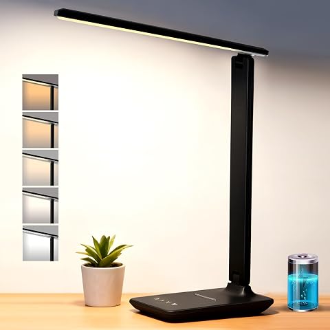 Lampe de bureau LED rechargeable Joyshie noire et pliable, posée sur une table en bois.
